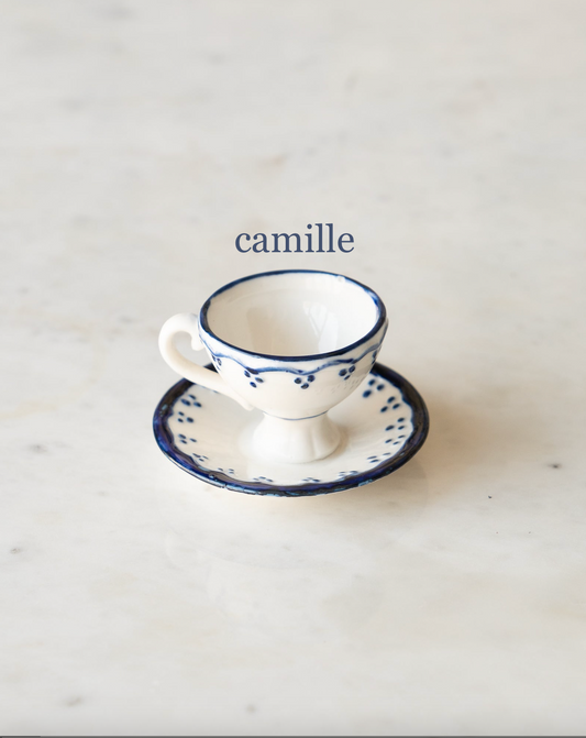 Tiny round tea cup and saucer with blue and white flower,. "camille". 