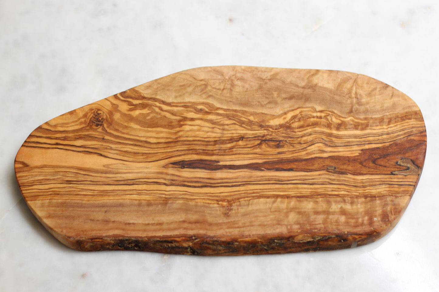 maman wooden board — wood pattern and silhouette close up