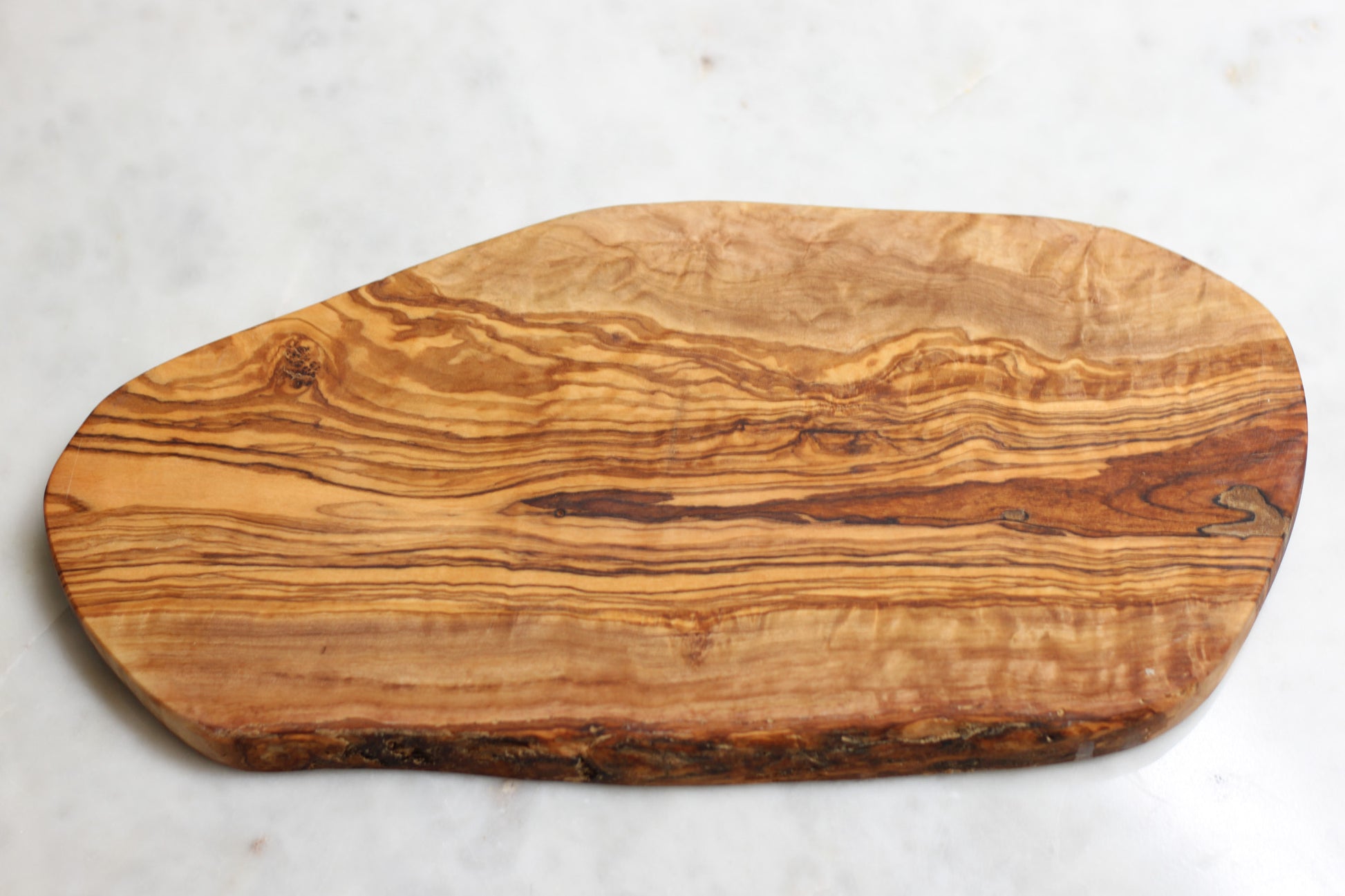 maman wooden board — wood pattern and silhouette close up