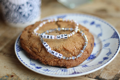 maman x Little Words Project boy mom and girl mom bracelets on a maman cookie