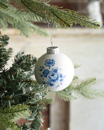 bola de cristal floral azul y blanca 