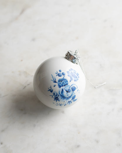 bola de cristal floral azul y blanca 